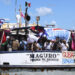El barco 'Maguro' de la delegación mexicana del convoy Nuestra América zarpa con destino a Cuba, cargado de ayuda humanitaria, este viernes desde el puerto de abrigo de Yucalpetén, en Yucatán, México. Foto: EFE/ Lorenzo Hernández.