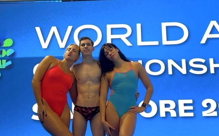 Andrea Becali, Vladimir Hernández y Laurent Estrada (izquierda a derecha), tres de los nadadores que representarán a Cuba en los Juegos Centroamericanos y del Caribe de Santo Domingo 2026. Foto: World Aquatics/Archivo