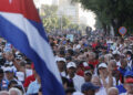 Conmemoración del aniversario 65 de la proclamación del carácter socialista de la revolución cubana, este jueves, en La Habana. Foto: EFE/ Ernesto Mastrascusa