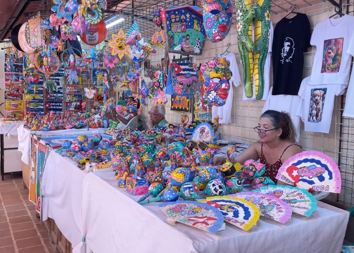 Ivette waits for the few tourists who do visit, hoping to make at least one sale a day. Photo: Lied Lorain. 