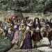 Luis XIV en los jardines de Versalles rodeado de su corte. Grabado del siglo XIX.