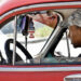 Un hombre conduce un vehículo en La Habana. Foto: Ernesto Mastrascusa/EFE.